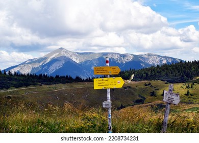 Austria, signposts on Rax mountain in Lower Austria with Schneeberg mountain behind, both part of Vienna Alps - Shutterstock ID 2208734231