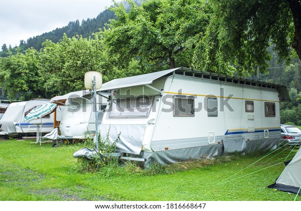 AUSTRIA-AUGUST,2019 : Camper trailer parking in\
summer camp\
site.
