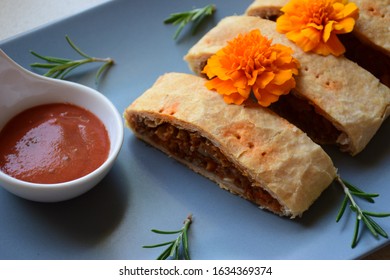 Austrian Cabbage Strudel With Minced Meat And Tomato Dip