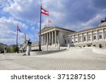 Austrian parliament building with famous Pallas Athena fountain and main entrance in Vienna, Austria