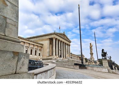 The Austrian Parliament Building in Vienna with statue of Pallas-Athene-Brunnen, the greek goddess of wisdom.