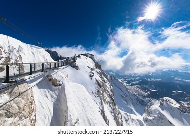 Austrias highest suspension bridge in the austrian Alps. Skywalk on Dachstein. Schladming, Styria, Austria 
Spectacular winter landscape and breathtaking views.