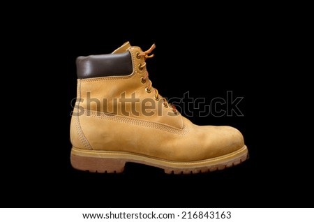 Authentic 8 inch Yellow Work Boot isolated on black