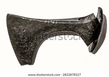 Authentic ancient bearded axe head from Kievan Rus and Viking era. Medieval forged iron battleaxe weapon archaeological artifact isolated on white background.