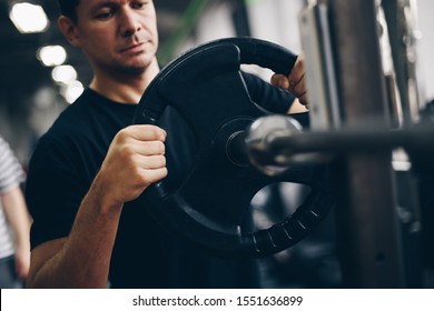 Authentic Image, Fit Man Lifting Weights, Barbell Overhead Press. Concept Of Weight Loss And Healthy Living.