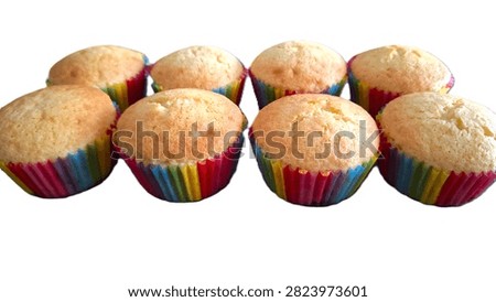 Authentic, imperfect rustic-looking cupcakes featuring vibrant rainbow layers and cracked surfaces, symbolizing real home baking for Pride Month. Close-up of basic, easy-to-make rainbow celebration cupcakes with naturally cracked tops, perfect for casual cooking blunders, love, and diversity themes.  Charm of vanilla, citrus, orange, lemon, plain cupcakes with cracked tops and rustic appearance in colorful rainbow wrappers.