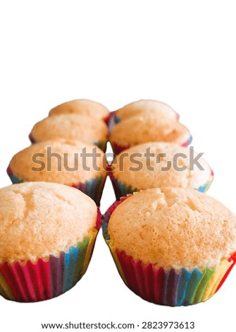 Authentic, imperfect rustic-looking cupcakes featuring vibrant rainbow layers and cracked surfaces, symbolizing real home baking for Pride Month. Close-up of basic, easy-to-make rainbow celebration cupcakes with naturally cracked tops, perfect for casual cooking blunders, love, and diversity themes.  Charm of vanilla, citrus, orange, lemon, plain cupcakes with cracked tops and rustic appearance in colorful rainbow wrappers.