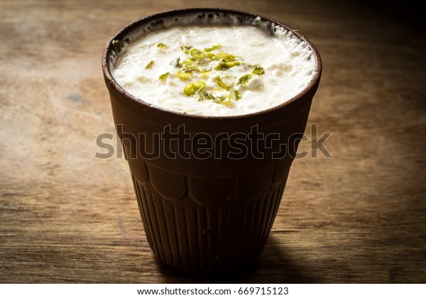 Authentic Indian cold drink made up of curd and milk\
called lassie 