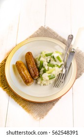 Authentic Irish Champ And Sausages On A Plate