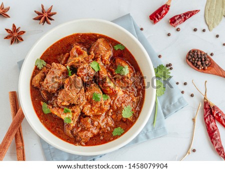 Authentic Lamb Vindaloo Traditional Fiery Red Goan Curry of Lamb.