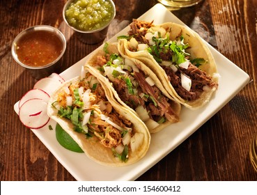 Authentic Mexican Barbacoa, Carnitas And Chicken Tacos