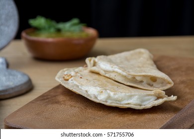 Authentic Mexican Quesadilla On Wooden Surface