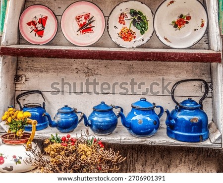 authentic model blue colored teapots and flower pots  nostalgia