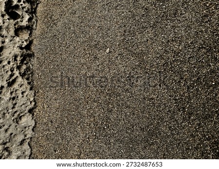 Authentic Natural Texture: High-quality shot of gritty volcanic sand and porous rock. Perfect for earthy web backgrounds, 3D material textures, and organic graphic design. High-resolution landscape detail for creative projects.
#NaturalTexture #SandBackground #RockTexture #OrganicDesign #GraphicAssets #StockPhotography #EarthyTones #MinimalistBackground #NatureDetails #CinematicTexture