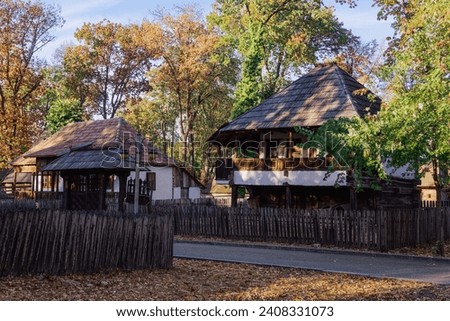 Authentic peasant settlements exhibiting traditional Romanian village life inside Dimitrie Gusti National Village Museum in Bucharest.