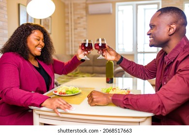 Authentic People African American Couple In Love Drinking Wine From Glasses And Eating Italian Pasta In Living Room 14 February Valentines Day