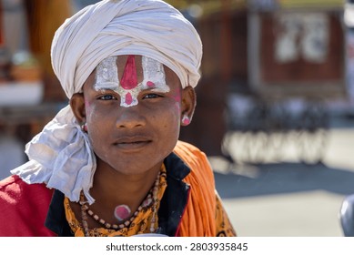 Authentic Portrait Of Indian Devotee In Ceremonial Attire And Traditional Makeup