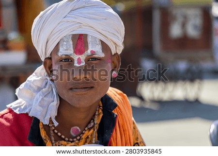 Authentic Portrait Of Indian Devotee In Ceremonial Attire And Traditional Makeup