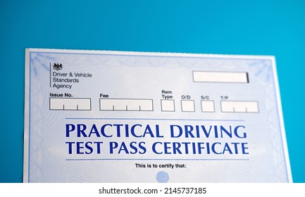 Authentic Practical Driving Test Certificate which is received after passing driving test in the UK. Stafford, United Kingdom, April 13, 2022.