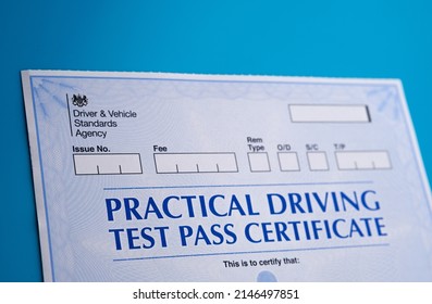 Authentic Practical Driving Test Certificate which is received after passing driving test in the UK. Stafford, United Kingdom, April 13, 2022.