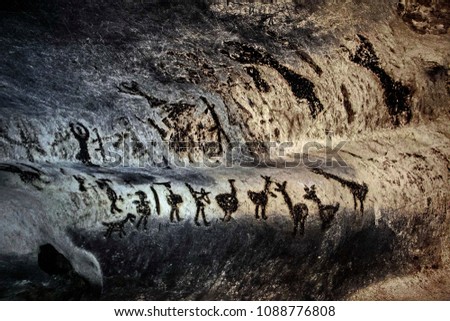 Authentic prehistoric cave paintings dating back 7000 years ago (European Post-Paleolithic era) in Magura cave, Belogradchik, Bulgaria.