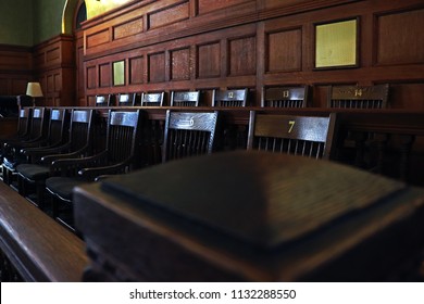 Authentic restored antique jury’s box in courthouse - Shutterstock ID 1132288550