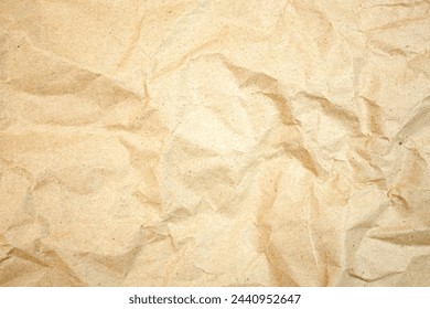 Authentic texture background of crumpled brown paper, packaging. Copy space crumpled paper.