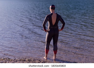 Authentic Triathlete Swimmer Portrait Wearing Wetsuit On Morning  Training