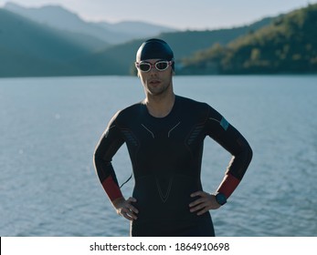 Authentic Triathlete Swimmer Portrait Wearing Wetsuit On Morning  Training