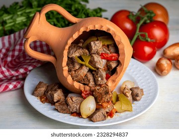 Authentic Turkish Testi Kebab cooked in earthenware waterjug, Turkish name; Testi kebabi
