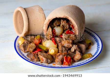 Authentic Turkish Testi Kebab cooked in earthenware waterjug, Turkish name; Testi kebabi