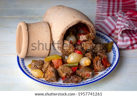 Authentic Turkish Testi Kebab cooked in earthenware waterjug, Turkish name; Testi kebabi