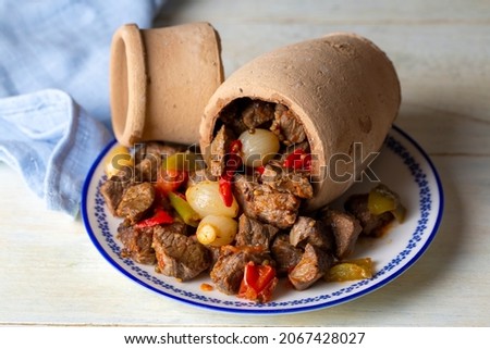 Authentic Turkish Testi Kebab cooked in earthenware waterjug, Turkish name; Testi kebabi