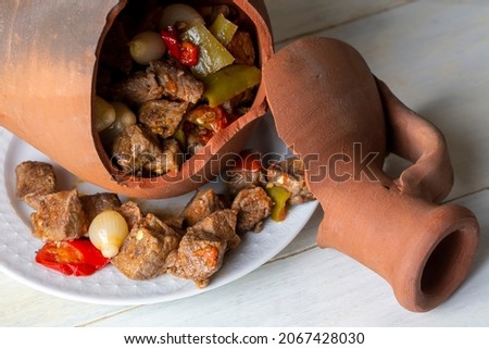 Authentic Turkish Testi Kebab cooked in earthenware waterjug, Turkish name; Testi kebabi