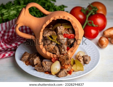 Authentic Turkish Testi Kebab cooked in earthenware waterjug, Turkish name; Testi kebabi
