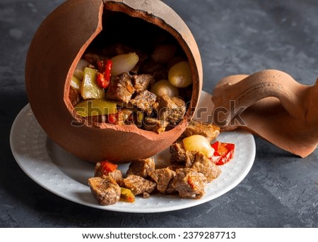 Authentic Turkish Testi Kebab cooked in earthenware waterjug, Turkish name; Testi kebabi