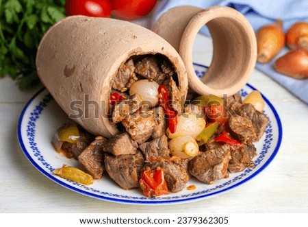 Authentic Turkish Testi Kebab cooked in earthenware waterjug, Turkish name; Testi kebabi