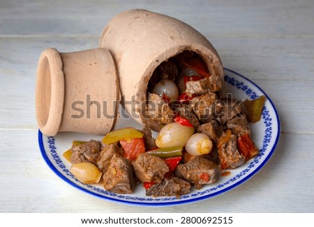 Authentic Turkish Testi Kebab cooked in earthenware waterjug, Turkish name; Testi kebabi