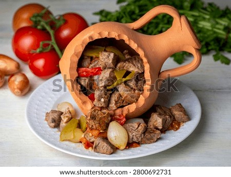 Authentic Turkish Testi Kebab cooked in earthenware waterjug, Turkish name; Testi kebabi