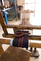 Authentic Weaving Machine, Which Weave Patterns On Fabric Tunisian Weavers. Mahdia. Tunisia. Africa.