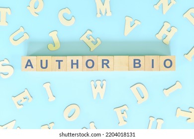 Author Bio Or Biography Part Of A Book Concept. Wooden Blocks Typography Word Flat Lay In Blue Background