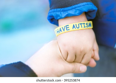 Autism Awareness Picture-I Have Autism -Autism Mom Holding Hand Her Autistic Child 
