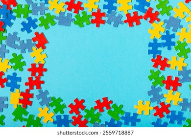 Autism puzzle.Autism awareness day. Colorful bright puzzles.Puzzle. 2 April world autism awareness day background. Top view. Space for text.Copy space.Design element.Care Awareness campaign for Autism - Powered by Shutterstock