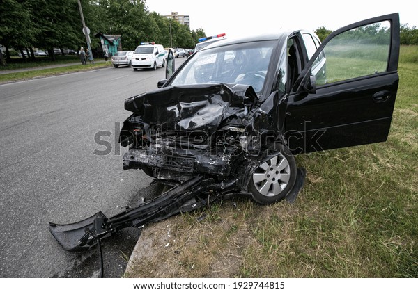 Auto accident. Crashed car in the street.\
Damaged car after\
collision