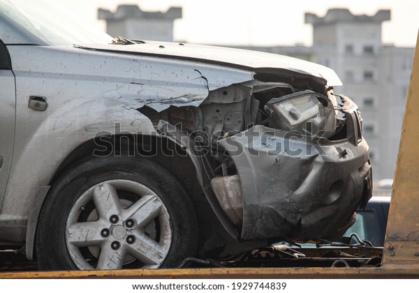 Auto accident. Crashed car in the street.\
Damaged car after\
collision
