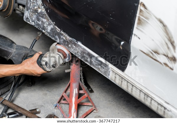 Auto body\
repair series : Mechanic grinding car\
body