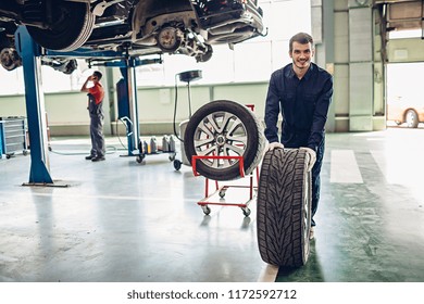 Auto Car Repair Service Center. Mechanic At Work