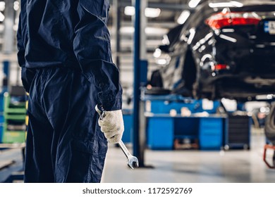 Auto Car Repair Service Center. Mechanic At Work