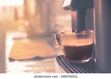 Auto Coffee Maker And A Cup In The Office Room.