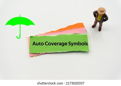 Auto Coverage Symbols.The Word Is Written On A Slip Of Colored Paper. Insurance Terms, Health Care Words, Life Insurance Terminology. Business Buzzwords.